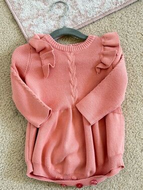 Baby Knit One-Piece in Dusty Coral with Ruffle Shoulders